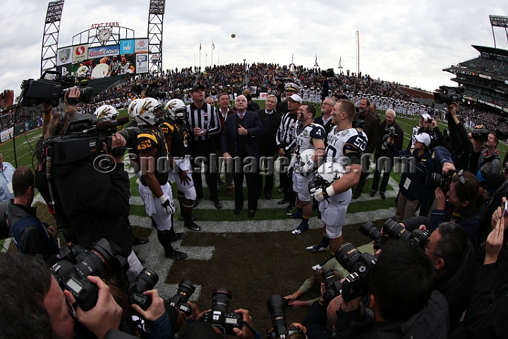 122912 Kraft SA-015.JPG - Dec 29, 2012; San Francisco, CA, USA; Senator John McCain of Arizona (center) conducts the coin toss  before the 2012 Kraft Fighting Hunger Bowl at AT&T Park.